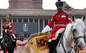 Smt Droupadi Murmu presents Silver Trumpet and Trumpet Banner to the President's Bodyguard_4.1