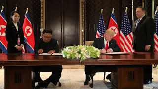 ट्रम्प और किम ने ऐतिहासिक वार्ता के बाद परमाणुकरण समझौते पर हस्ताक्षर किये |_40.1