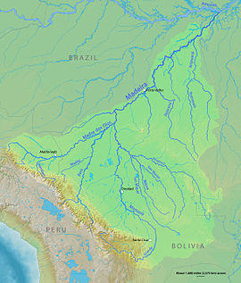 Tributary  Marathi Meaning of Tributary