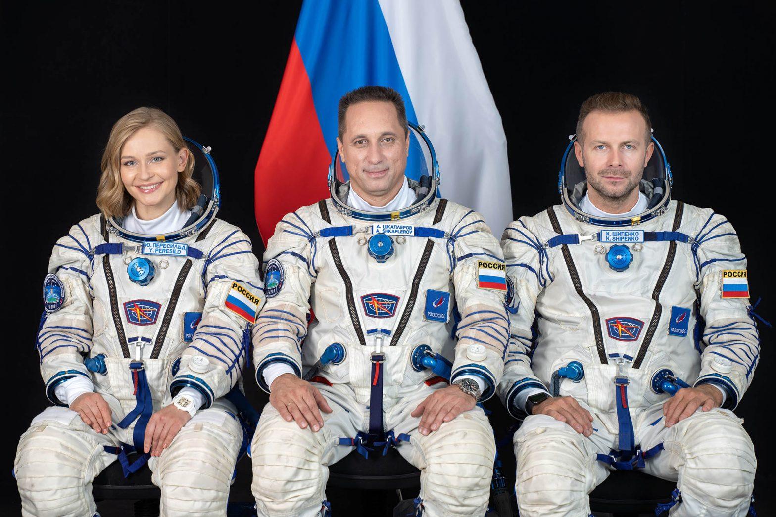 Russian team back on Earth after filming first movie in space