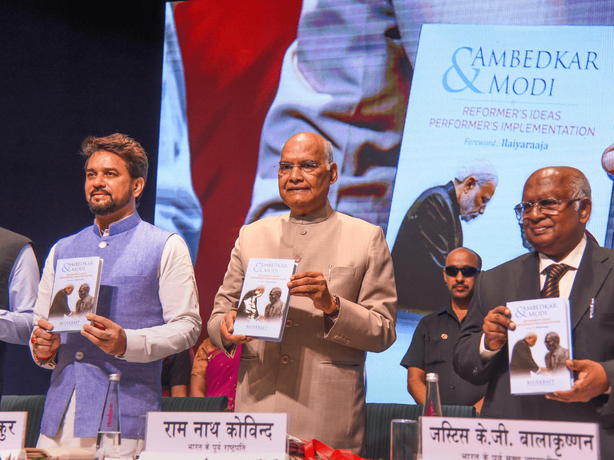 A book titled "Ambedkar and Modi" released by former President Ram Nath Kovind_40.1