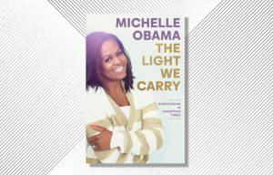 A book titled "The Light We Carry: Overcoming In Uncertain Times" by Michelle Obama_4.1